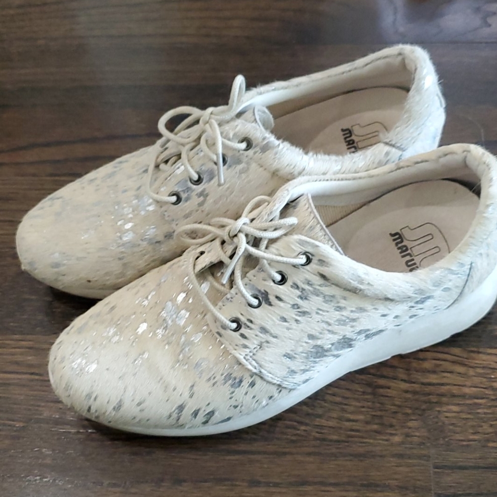 Barely worn pony hair sneakers with silver